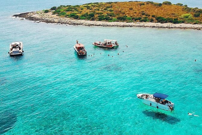 Blue cave group tour with swimming and snorkelling from Hvar - Stiniva Cove brings the cliffs close
