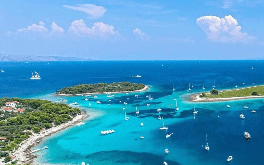 Blue Lagoon Boat Tour from Trogir with Lunch and Drinks - Drinks, fruit, and onboard extras