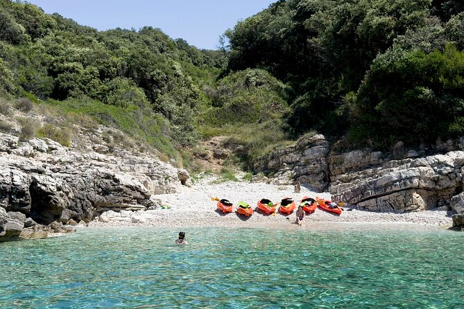 BOAT & KAYAK! Sea Adventure - Snorkeling & Cliff Jumps - Paddling past Pula’s high cliffs