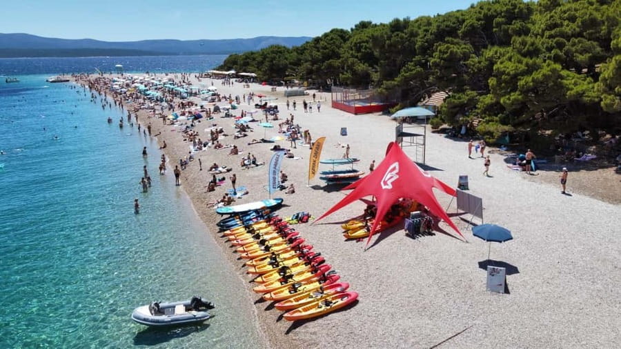 Bol: Zlatni Rat Beach Kayak Tour with Snorkeling - Caves, coves, and a different coast