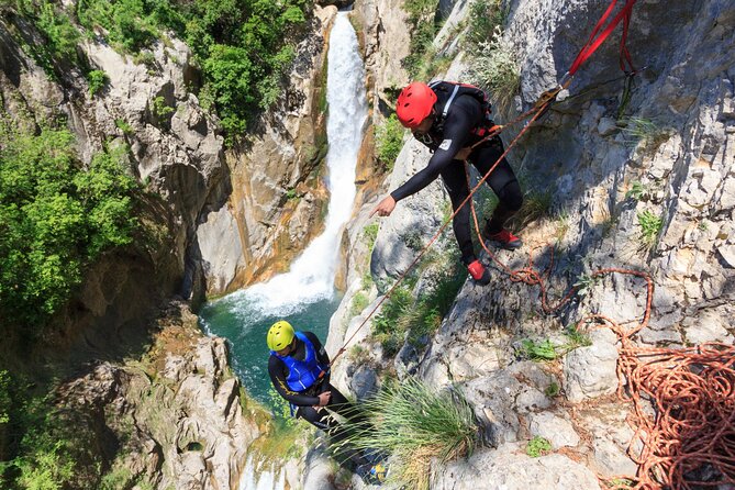 Cetina River Extreme Canyoning Adventure from Split or Zadvarje - Entering the River by Swimming, Sliding, and Scrambling