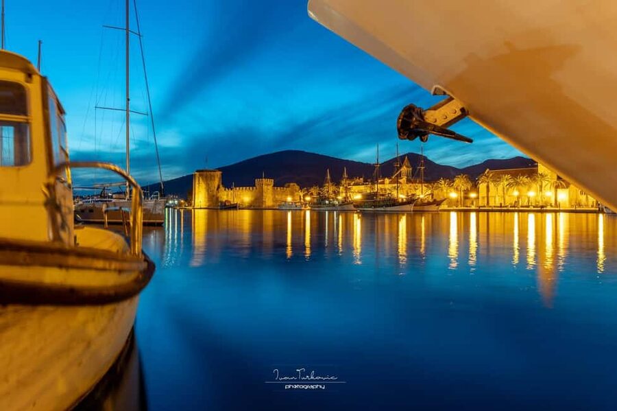 Discover Trogir: Guided Walking Tour of a Medieval Gem - Entering Trogir through the old town gate