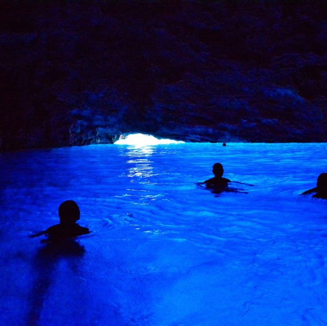 Dubrovnik: Blue & Green Caves Private Boat Tour with Drinks - Entering the Blue Cave at Koločep