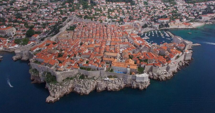 Dubrovnik: Guided Old City Walking Tour - The old port and Dubrovnik’s outward-looking character
