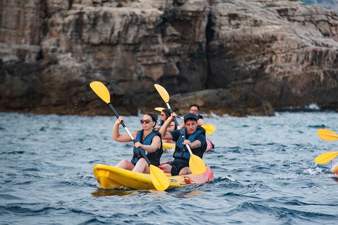 Dubrovnik: Sea Kayaking & Snorkeling - Returning beneath the old town walls