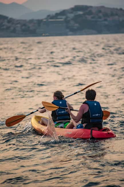 Dubrovnik: Sunset Kayaking and Snorkeling Tour - What to pack for a dry and comfortable evening