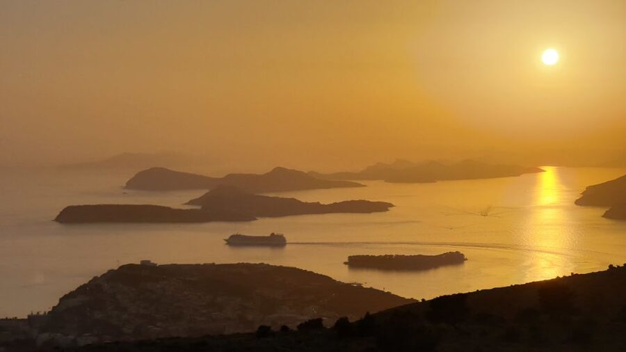 Dubrovnik: Sunset Panorama Tour with Glass of Wine - Guides, group size, and the human side