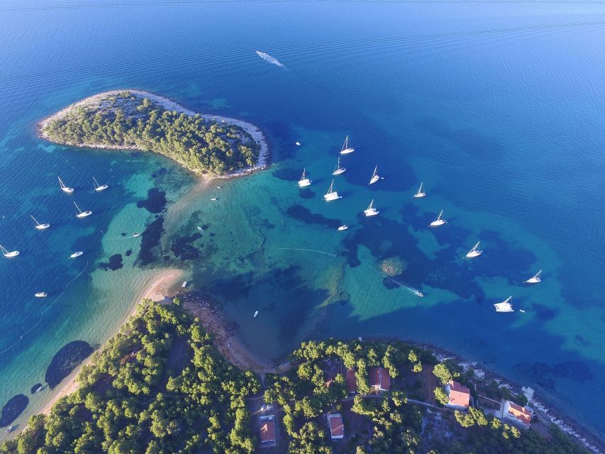 From Biograd: Golden Island of Vrgada Trip with Lunch - The sandy beach and clear blue water