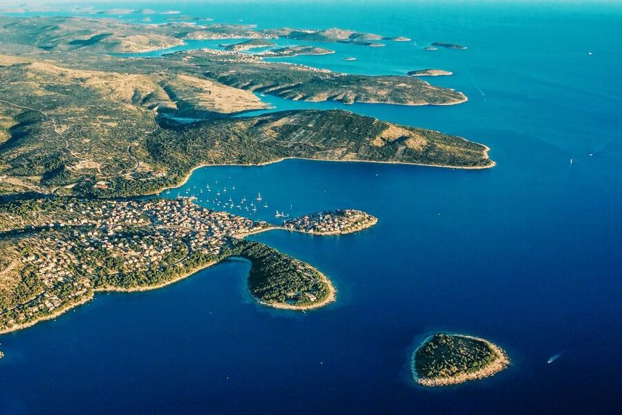 From Sinj: 1.5-Hour Private Flight over Kornati & Šibenik - Trogir, Kaštela, and the turn toward Primošten