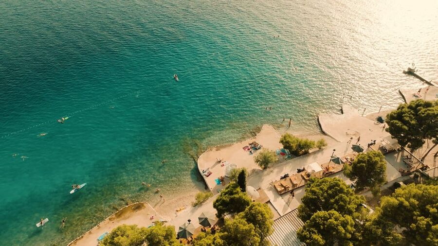 From Split: Brač Island Beach Bar and Pool Party - Pool, sea, cabanas, and time to slow down