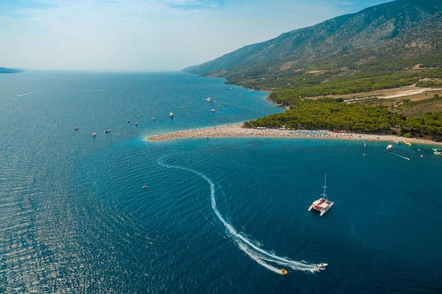 From Split: Catamaran Cruise to Golden Horn & Brač island. - The morning catamaran ride across the Adriatic