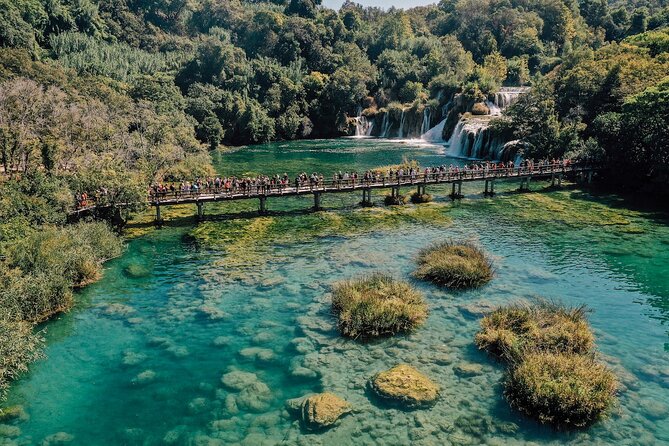 From Split: Krka Waterfalls, Food & Wine Tasting Tour - Walking the wooden paths at Krka National Park