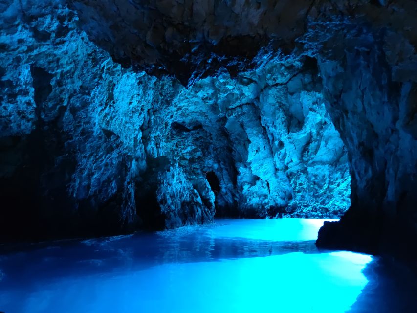 From Split: Luxury Cabin Boat Tour to The Blue Cave and Hvar - Swimming at the Blue Lagoon near Budikovac