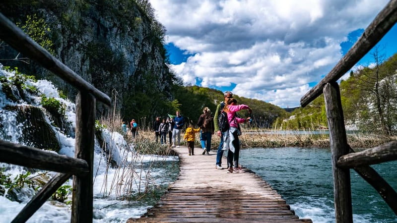 From Split: Plitvice Lakes Guided tour - The boat ride and electric train add variety