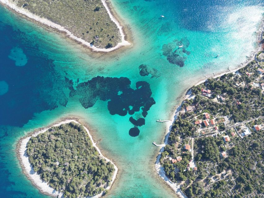 From Split: Trogir & Blue Lagoon Boat Tour with Snorkeling - Labadusa Beach, pine trees, and a second swim