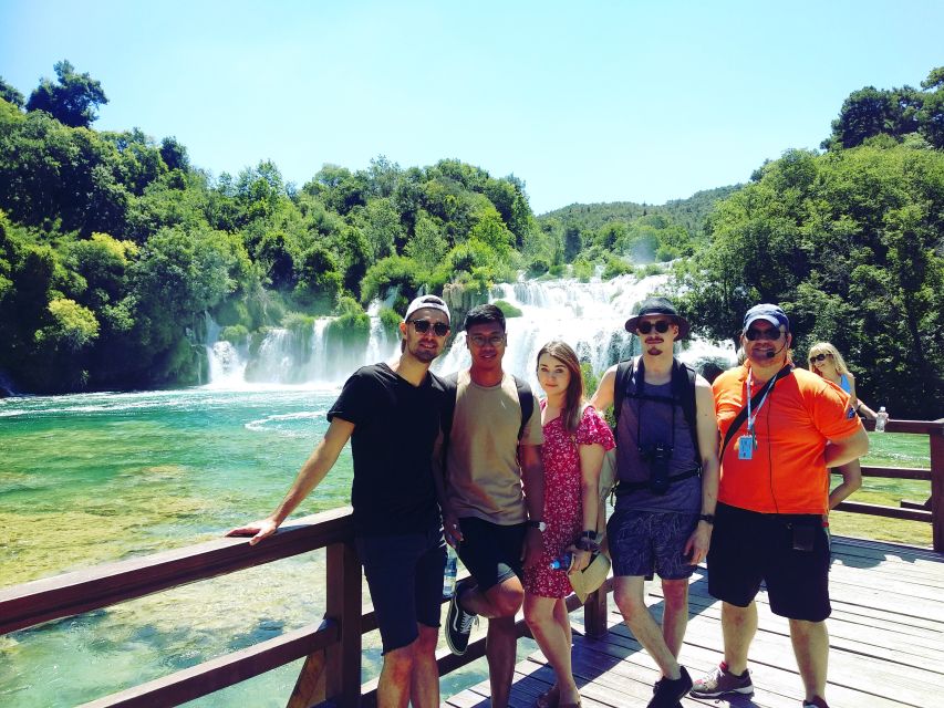 From Split & Trogir: Krka Waterfalls Day Tour with Boat Ride - Stone houses and an old watermill