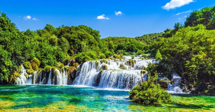 From Split & Trogir: Krka Waterfalls Day Tour with Boat Ride - Free time in Skradin