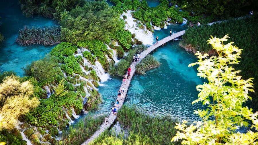 From Split/Trogir/Omiš: Plitvice Lakes Guided Group Tour - Entering a park built around water