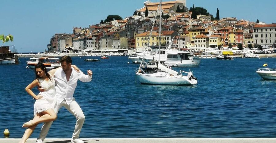 From Vrsar: Boat Trip to Rovinj and Lim Fjord - Boarding in Vrsar with a drink in hand