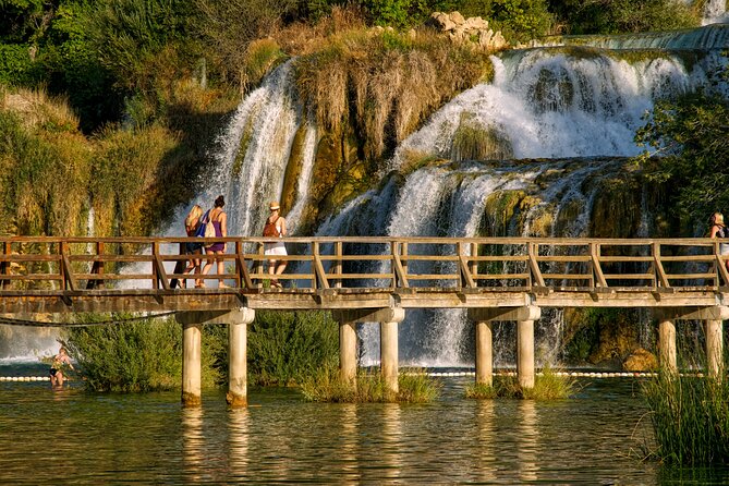 From Zadar: Krka National Park and Waterfalls Day Trip - Walking through the waterfall area