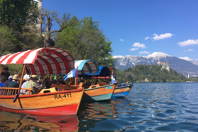 Full-Day trip to Lake Bled - A traditional pletna boat across the lake