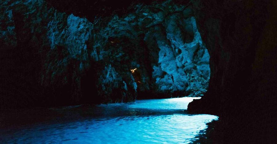 Hvar: Blue and Green Caves Boat Tour with Stiniva Beach - The Blue Cave and its brief blue glow