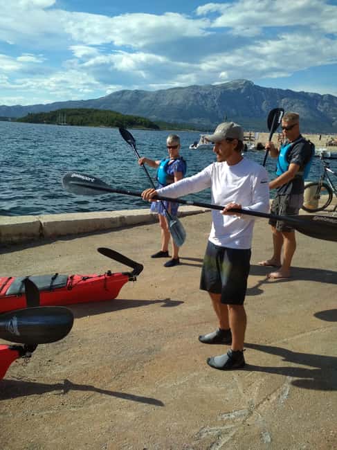 Lumbarda - Sunset Kayak Tour with a Picnic - Wine and Sweets - Paddling across Korčula’s clear water