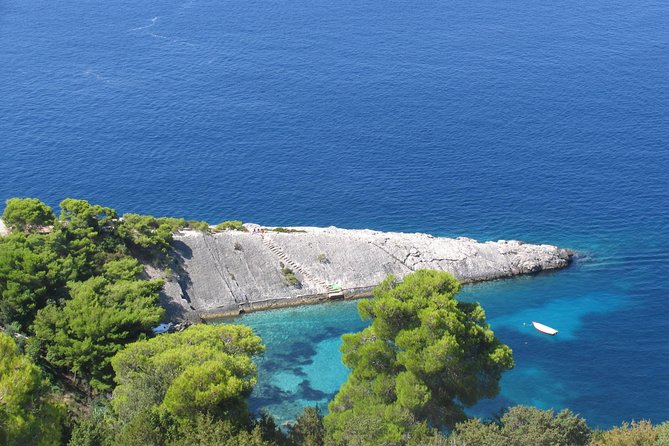 Mesmerizing Hvar speed boat tour with optional wine tasting - The Red Rocks from the water