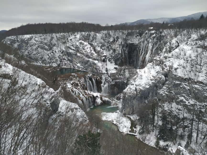 Plitvice Lakes: Guided Walking Tour with Boat Ride - Wooden paths, waterfalls, and the lower lakes