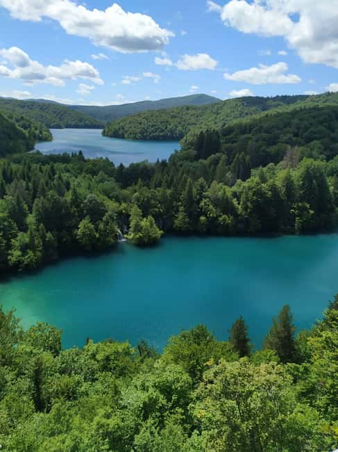 Plitvice Lakes: Guided Walking Tour with Train and Boat Ride - Riding the electric boat across the park