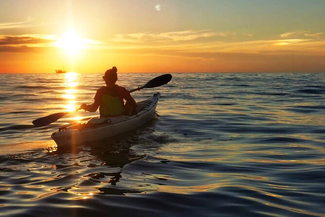Poreč sunset sea kayaking tour - Following the harbor toward the old town
