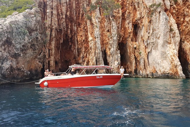 Private Custom Island Hopping Speedboat Tour from Hvar - Stiniva Cove behind towering rock walls