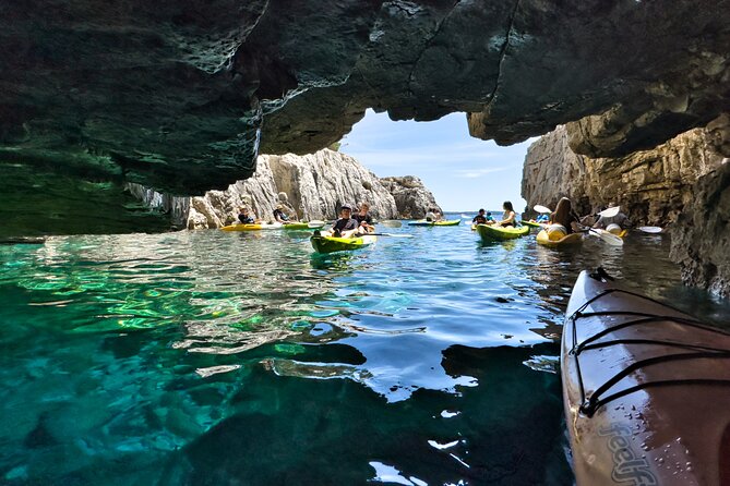 Private kayak tour: Explore the caves and turquoise bays in Pula - Paddling toward SeaGull Cave