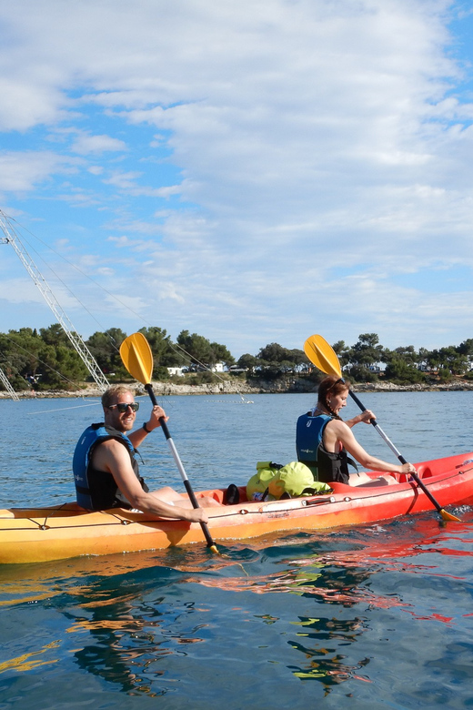 Pula: 3-hrs Kayak, Cliffs & Snorkeling Small Group Adventure - Cliff jumping with a guide nearby