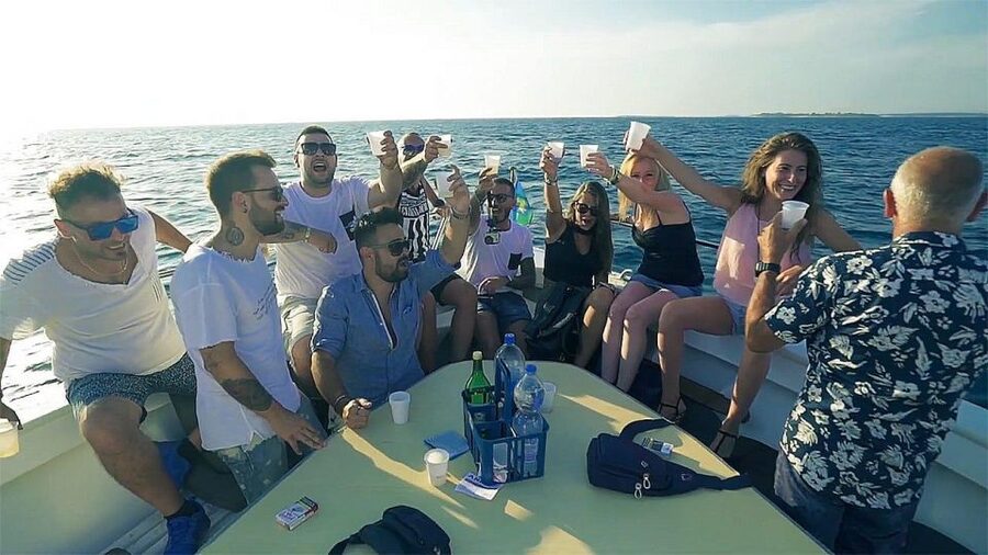Pula: Brijuni National Park Dolphin Watching Tour w/Dinner - Pula lights up on the return