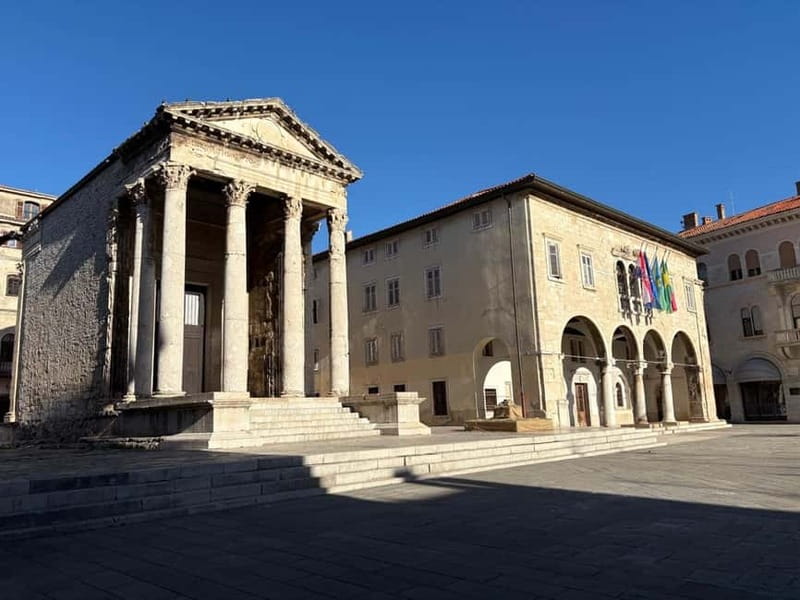 Pula by E-Bike: Roman Ruins, Sea Views & Hidden Gems - Pula’s Roman center on two wheels