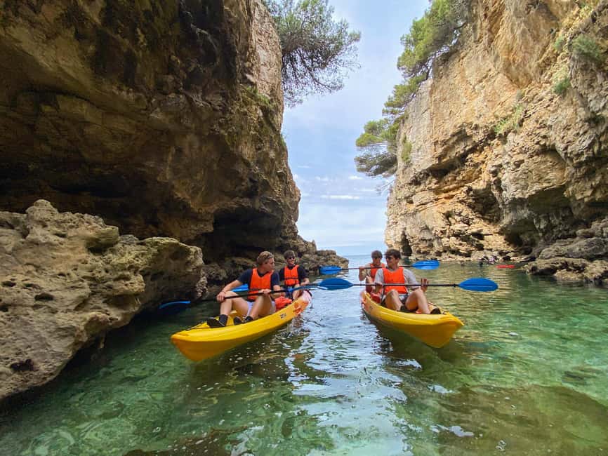 Pula: Cave Kayak Tour, Snorkeling and Island Jumping - Snorkeling, free time, and optional cliff jumping