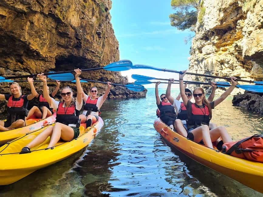 Pula: Cave Kayak Tour, Snorkeling and Island Jumping - Paddling along Pula’s open coast