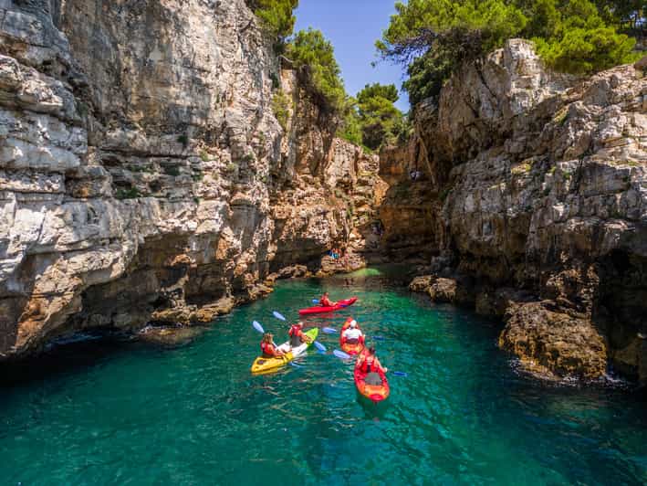 Pula: Kayak Adventure with Cave & Island Snorkeling - What the guiding style adds