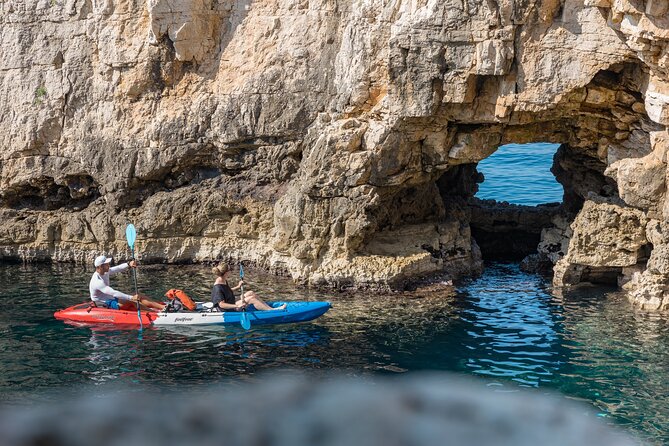 Pula Kayaking at Blue Cave with Cliffs Tour and Snorkeling - Swimming, cliffs, and a short beach break
