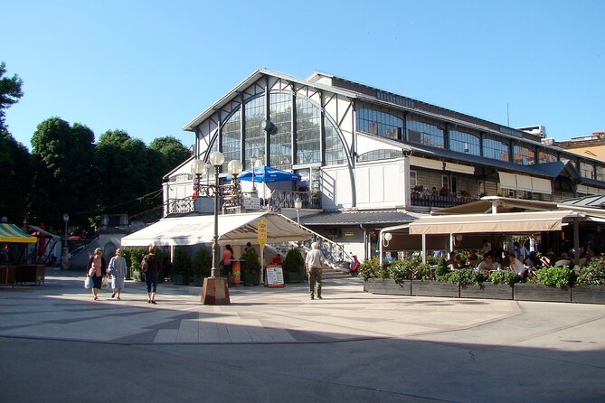 Pula Private 2-Hour Guided Walking Tour - The 1903 market shows Pula as a working city