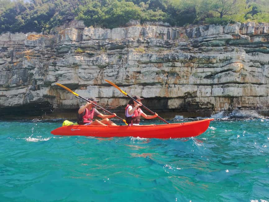 Pula: Sea Adventure – Boat, Kayak, Snorkeling & Cliff Jumps - Paddling along the Muzil Peninsula