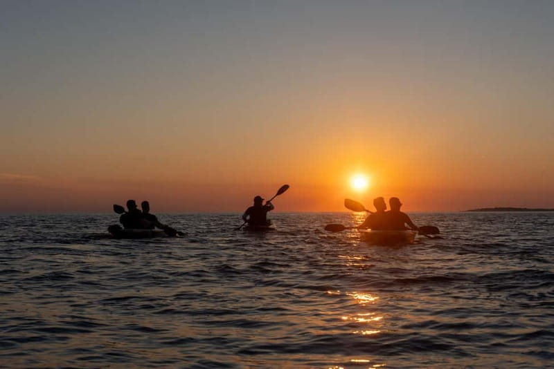 Pula:Sunset Kayak tour with glowing transparent kayak - Paddling the first stretch of coastline