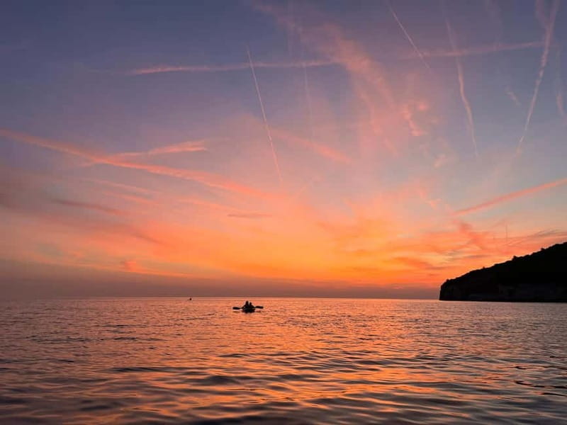 Pula: Sunset/Night Illuminated Transparent Kayak Tour - Entering the sea canyon by illuminated kayak