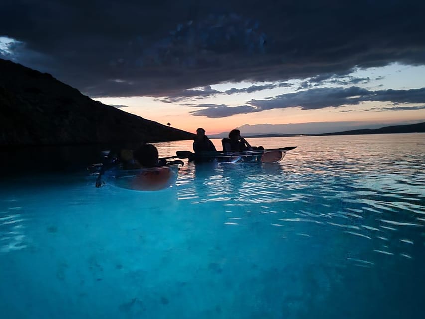 Rab: Night adventures illuminated transparent kayaks - Paddling through the one-hour night tour