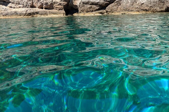 Rent a small boat without skipper - explore the islands and find hidden caves - Finding caves, coves, and quiet swimming stops