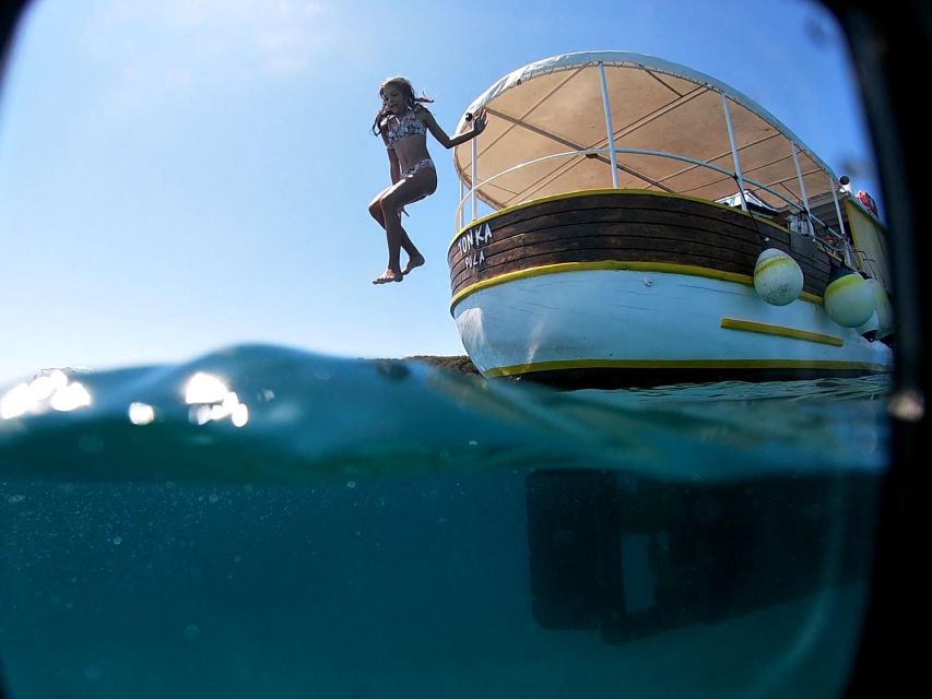 Rovinj Islands Boat Tour with Swimming - Fresh fruit and a scenic ride back