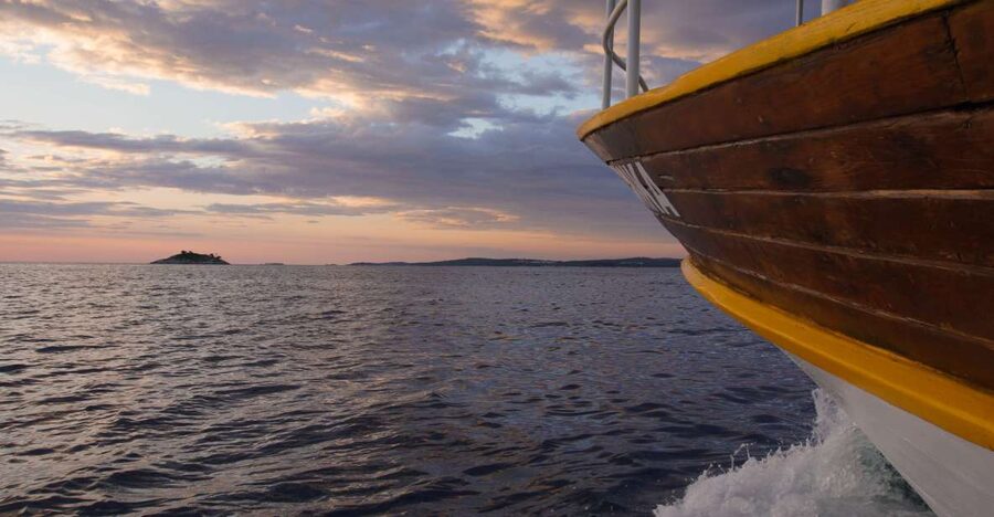 Rovinj: Sunset Boat Trip with Dolphin Watching - Leaving Valdibora for Rovinj’s coastal view