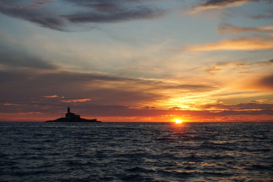 Rovinj: Sunset Boat Trip with Dolphin Watching - Passing Rovinj Island and the nearby islets