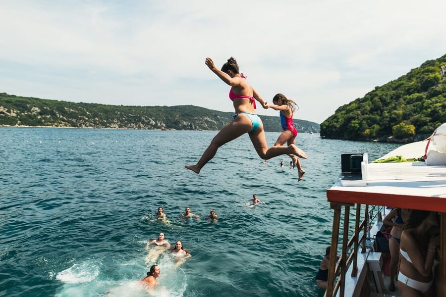 Rovinj: Sunset Cruise with Swim Stop, Drinks, and Fruits - Searching for dolphins near Rovinj
